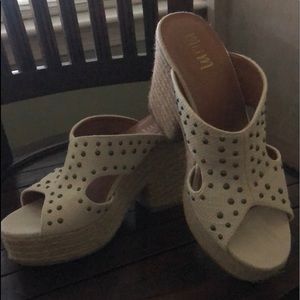 Espadrilles sandals, off white with accents on top.  Worn a handful of times